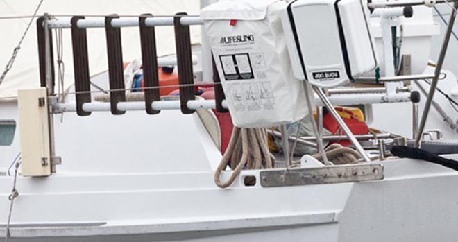 Mk 5 Jonbuoy beside a lifesling - this sailor wants to be REALLY secure ©  SW